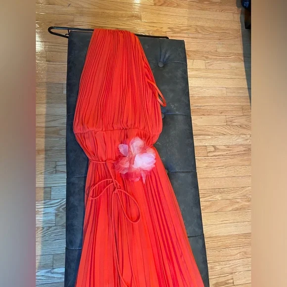 Beautiful vibrant orange high neck jumpsuit